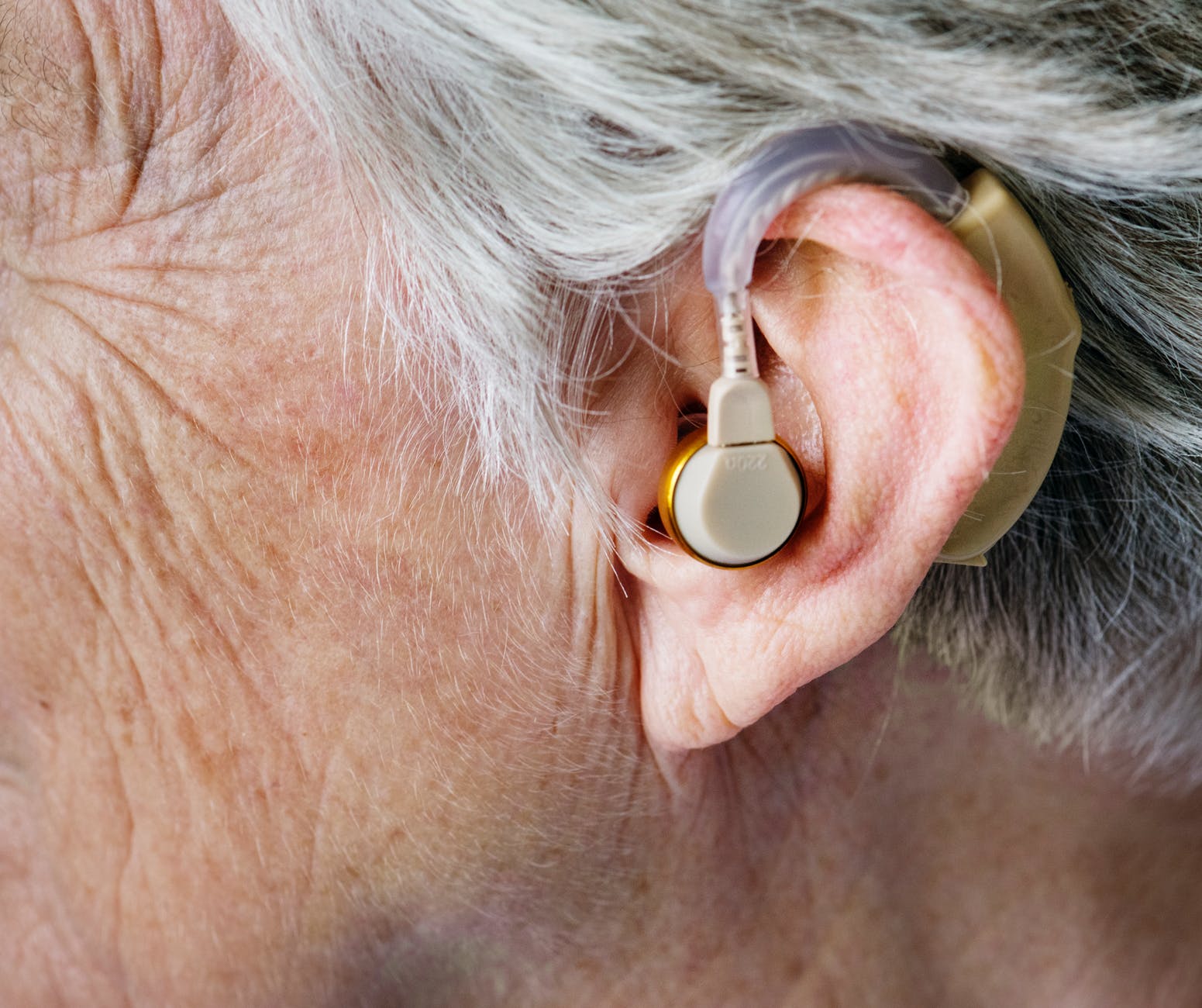 person wearing hearing aid